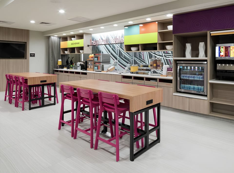 Gather for breakfast and coffee in this vibrant communal space.