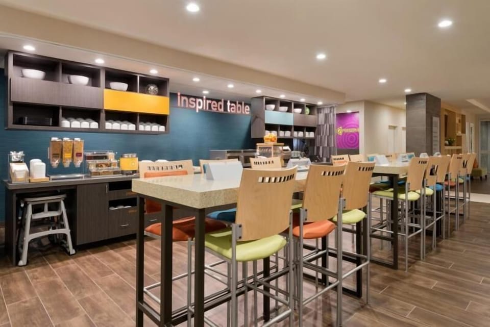 Fuel up comfortably with a generous breakfast bar and seating.