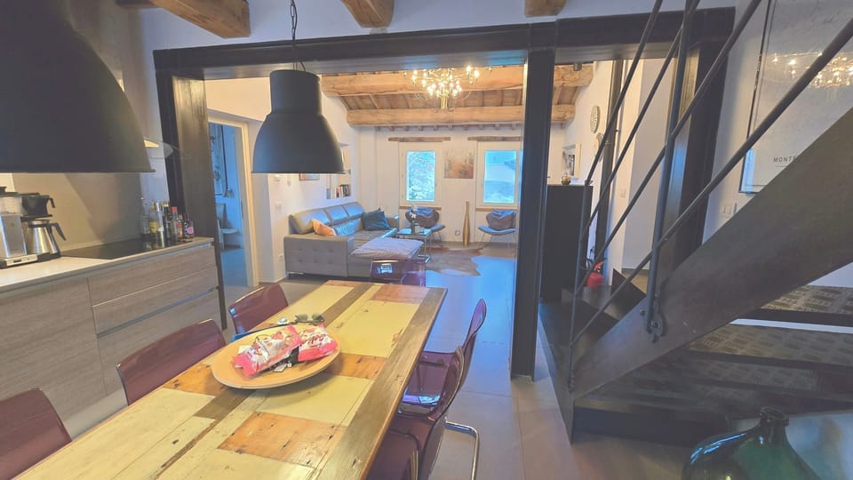 Kitchen with stairs up to tower room