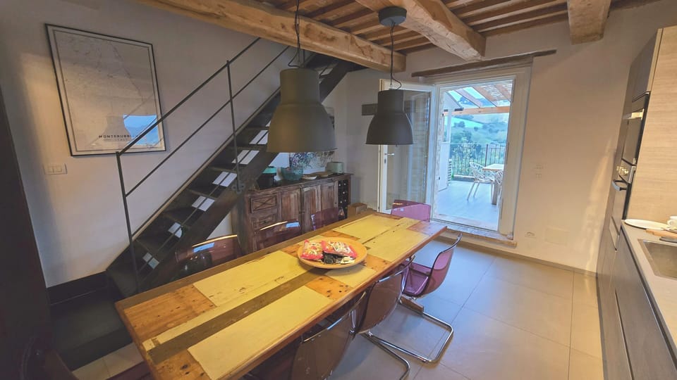 Kitchen, stairs and easy access to terrace 