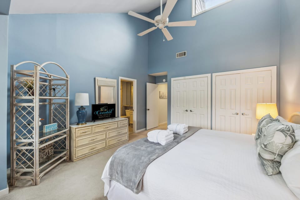 Bedroom 3 - king bed with flat screen tv and a ensuite bathroom with a walk-in shower.