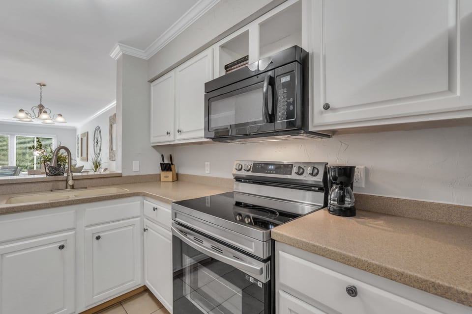 Kitchen with stainless steel appliances.
