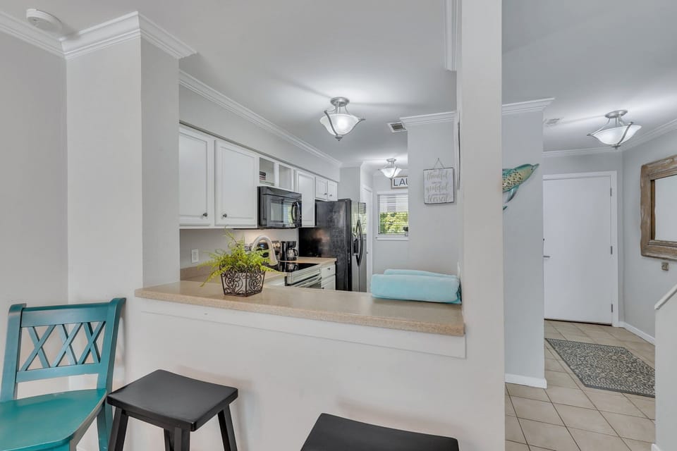 Kitchen with stainless steel appliances.
