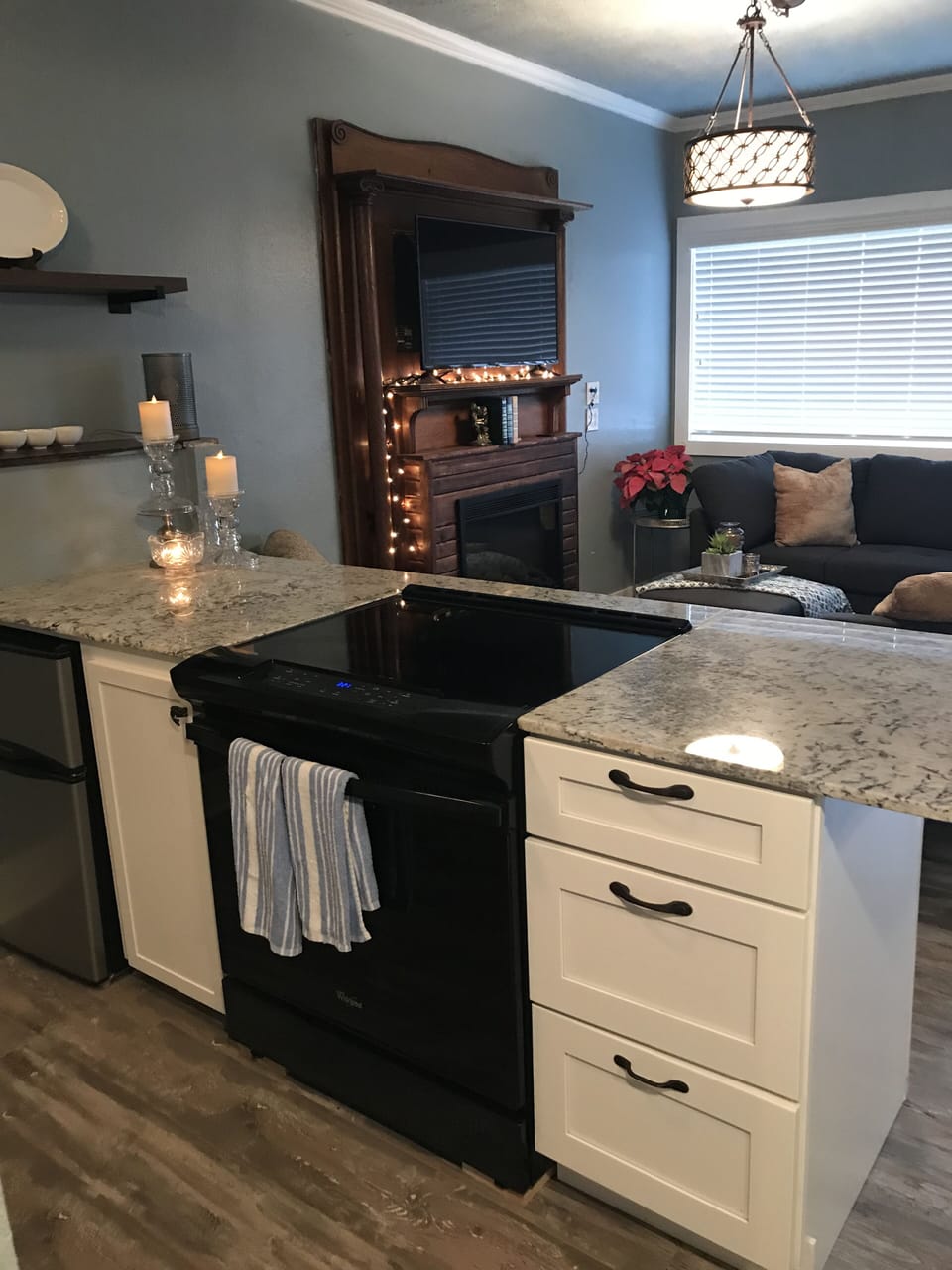 New kitchen island with full stove and granite counter top