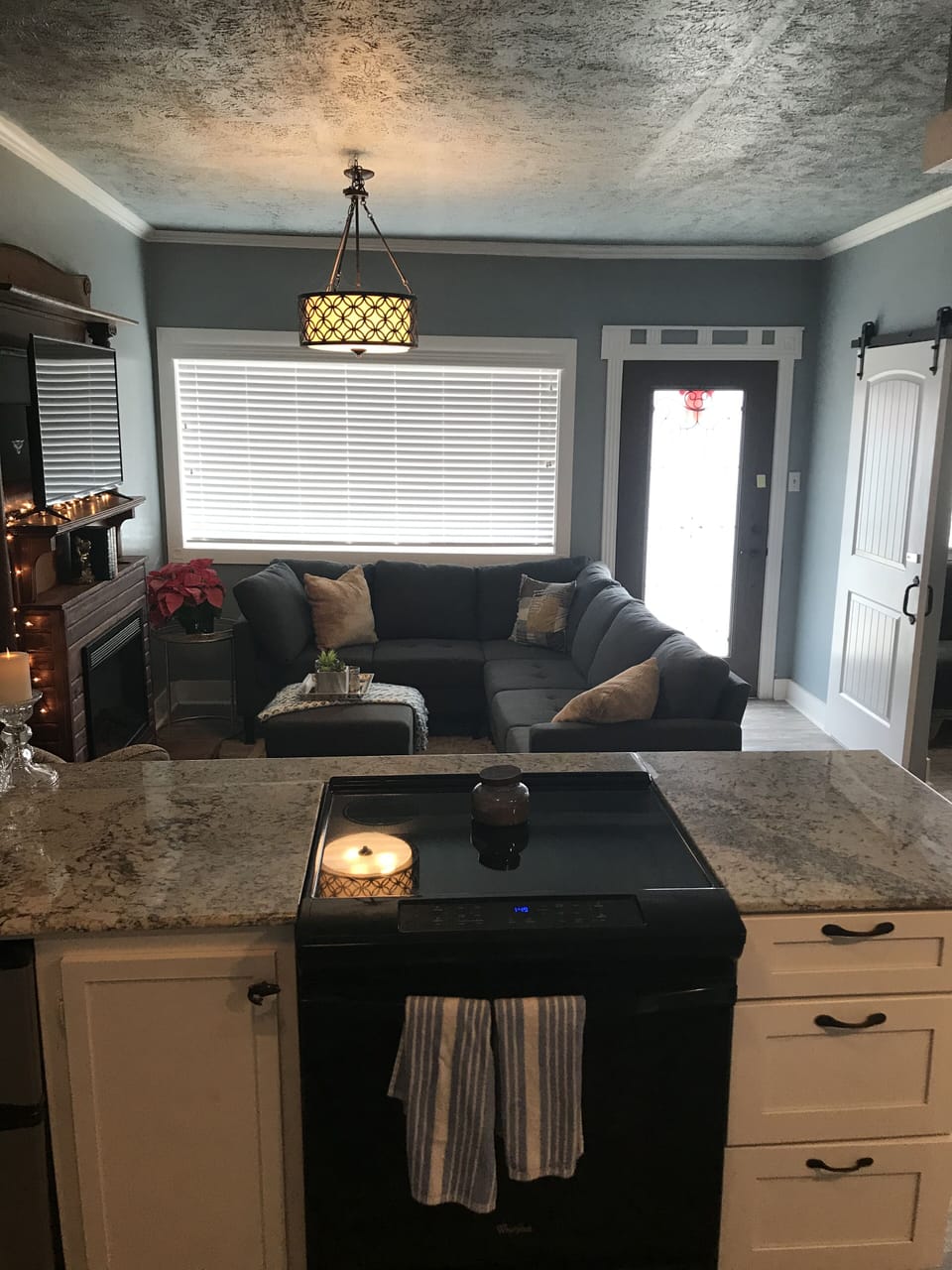 New granite counter top with new glass top oven and mini refrigerator. 