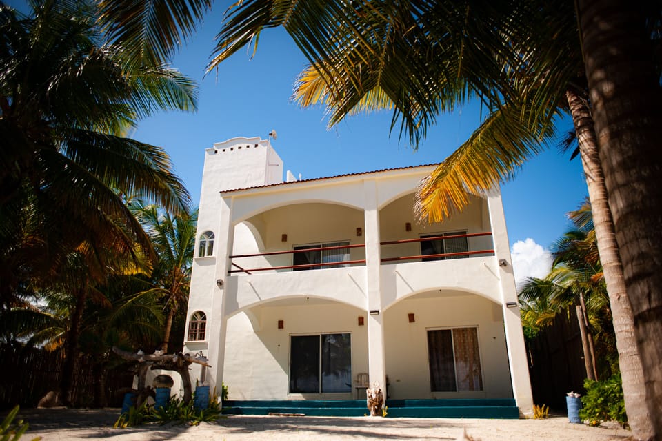 A large oceanfront deck and patio provide plenty of outdoor living space