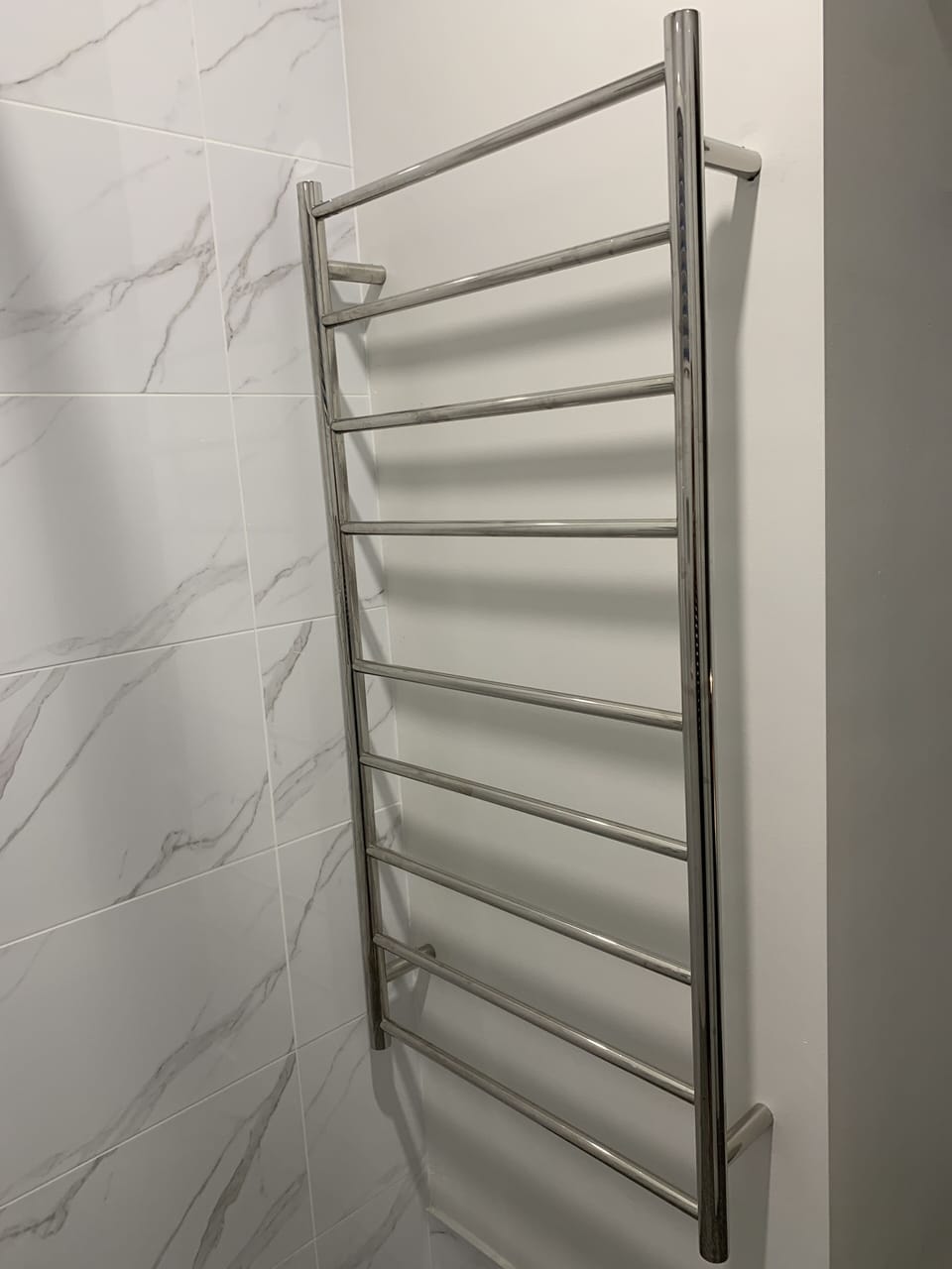 Heated towel rail in all three bathrooms.