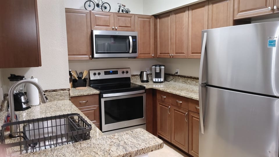 New refurbished kitchen with granite counter top.