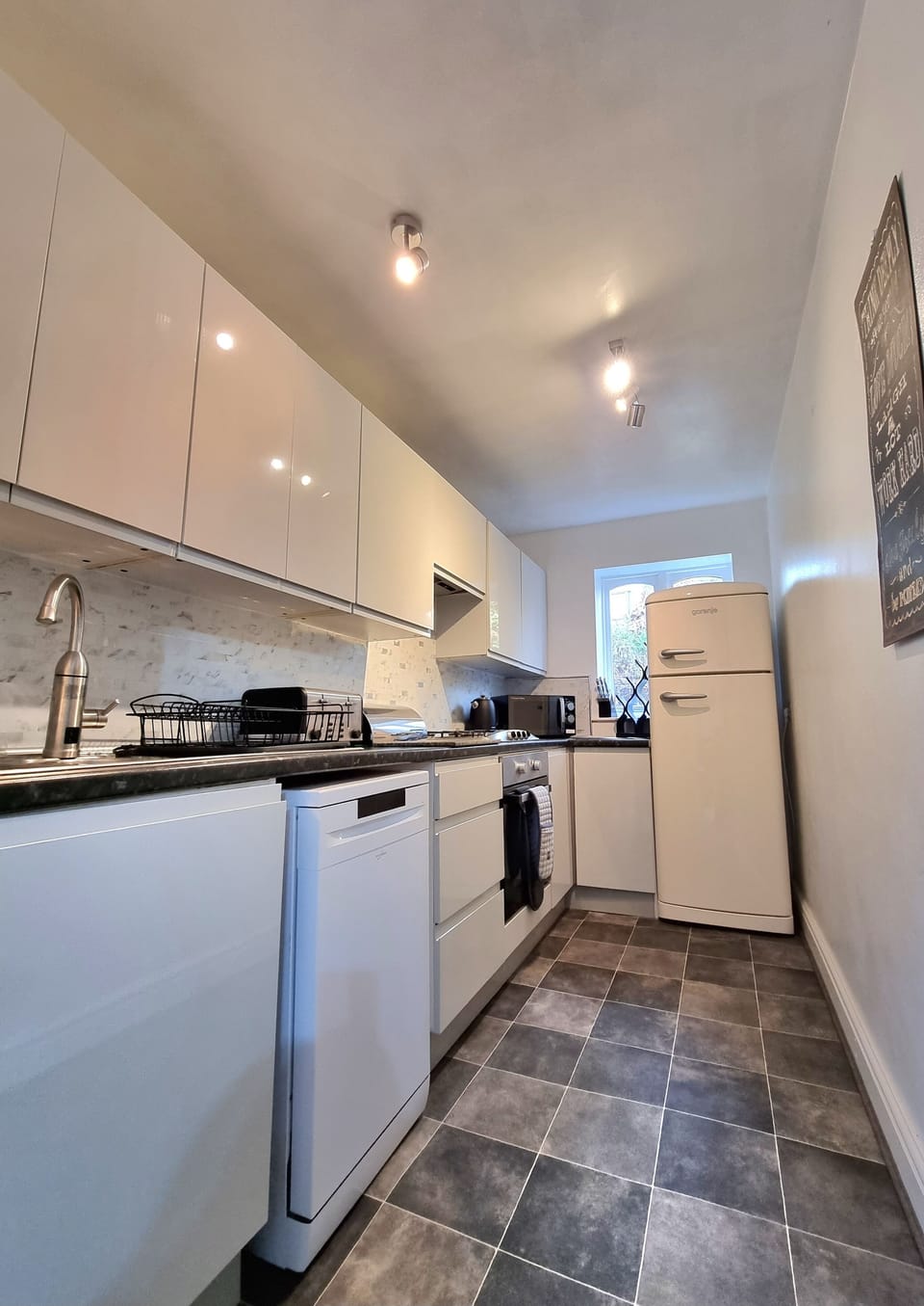 Newly Fitted Kitchen with High Gloss Doors & Retro Fridge Freezer