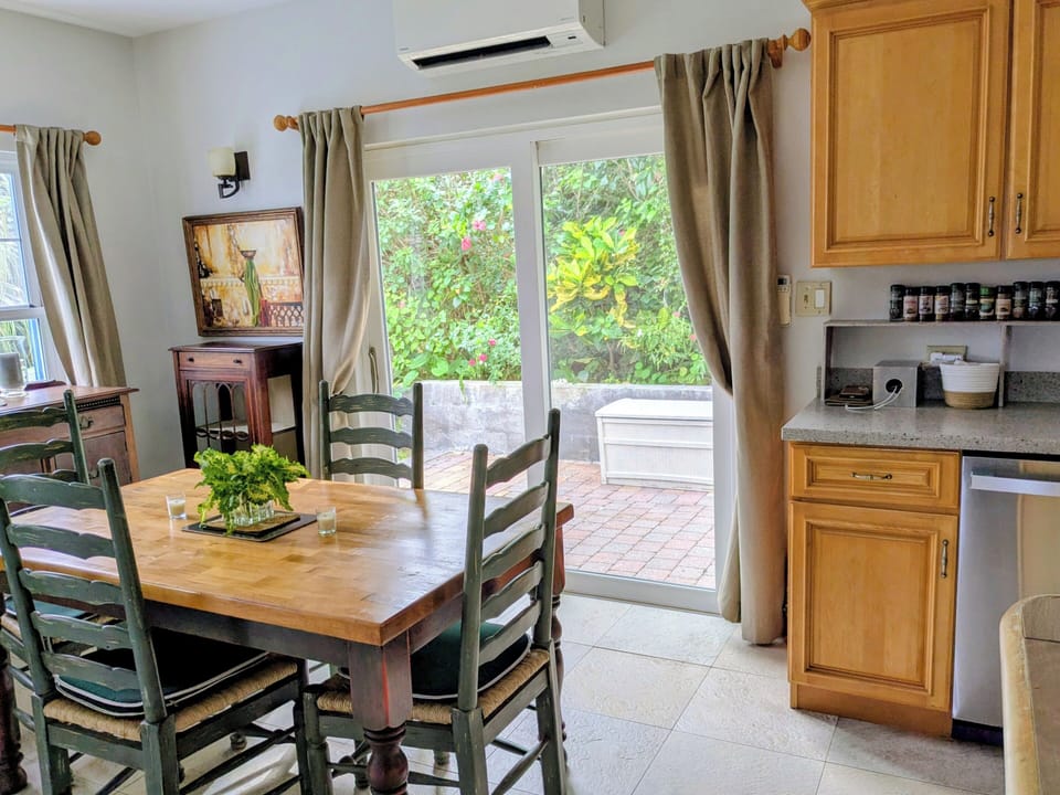 Dining room and out to back patio with electric awning