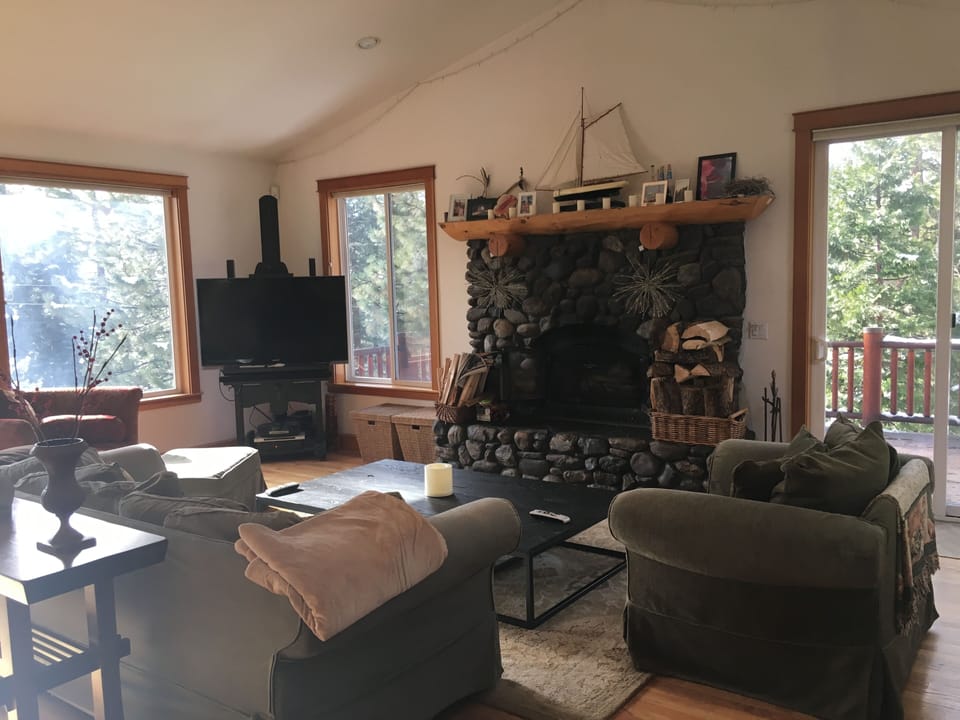 Large coffee table, wood burning fireplace, wood supplied