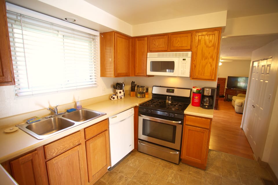 LARGE KITCHEN WITH DOUBLE DOOR FRIG, GAS STOVE, DISHWASHER, MICROWAVE 