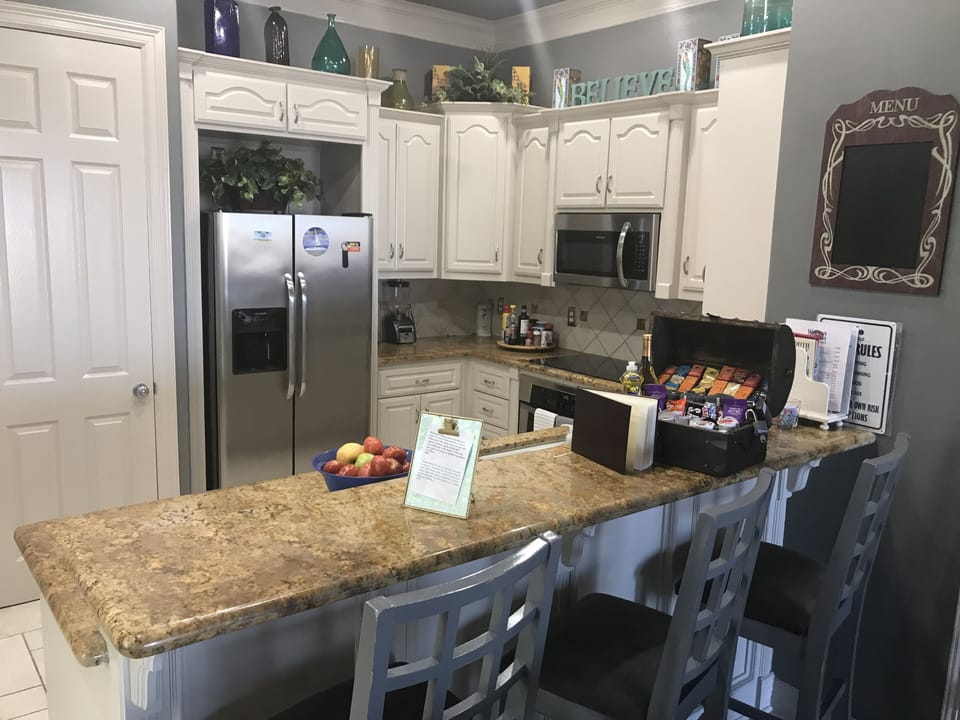 Bar stools bring indoor seating to 11. FULLY EQUIPPED CHEF's KITCHEN. Full Views