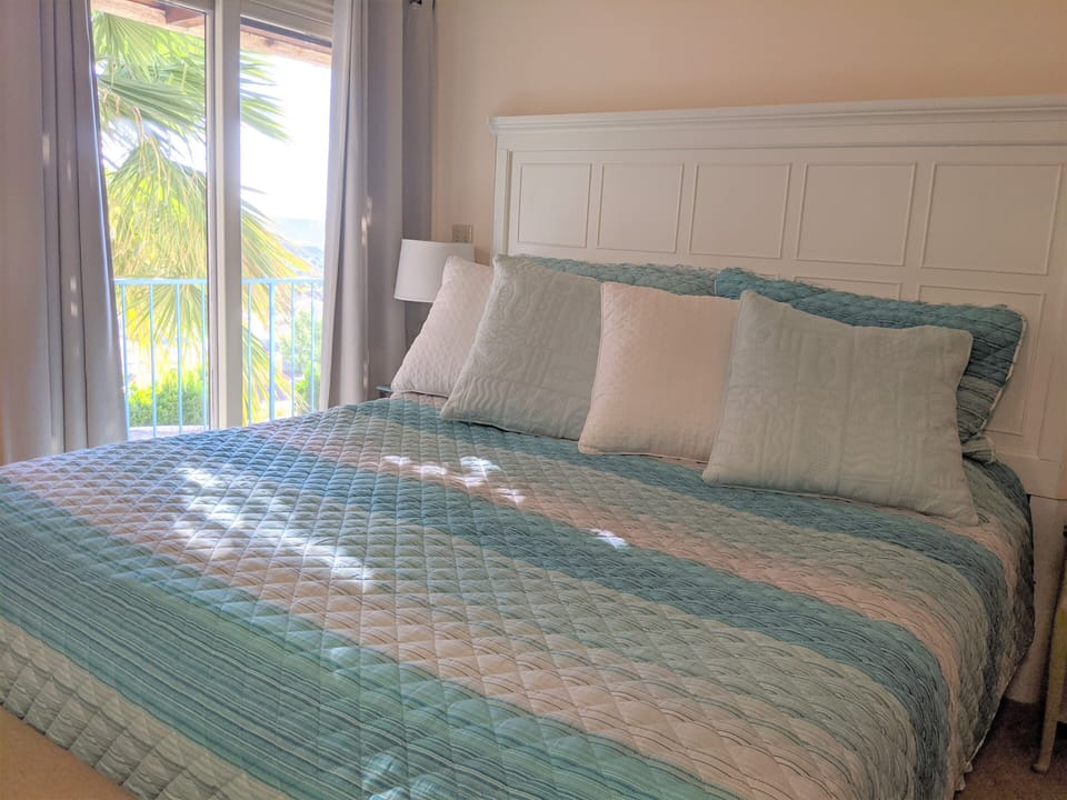 Light Master Bedroom with King Bed.