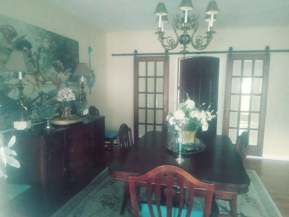 common dining room. door to king suite in background