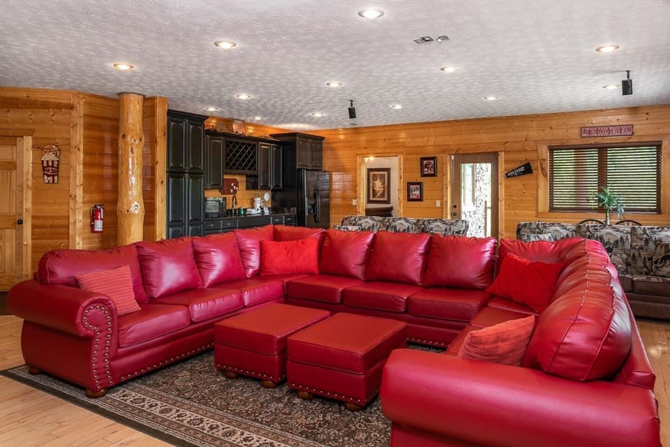 Ample seating in comfortable sofas in the movie theater.