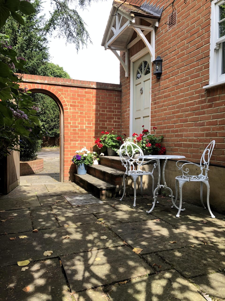 The pretty front door and garden 