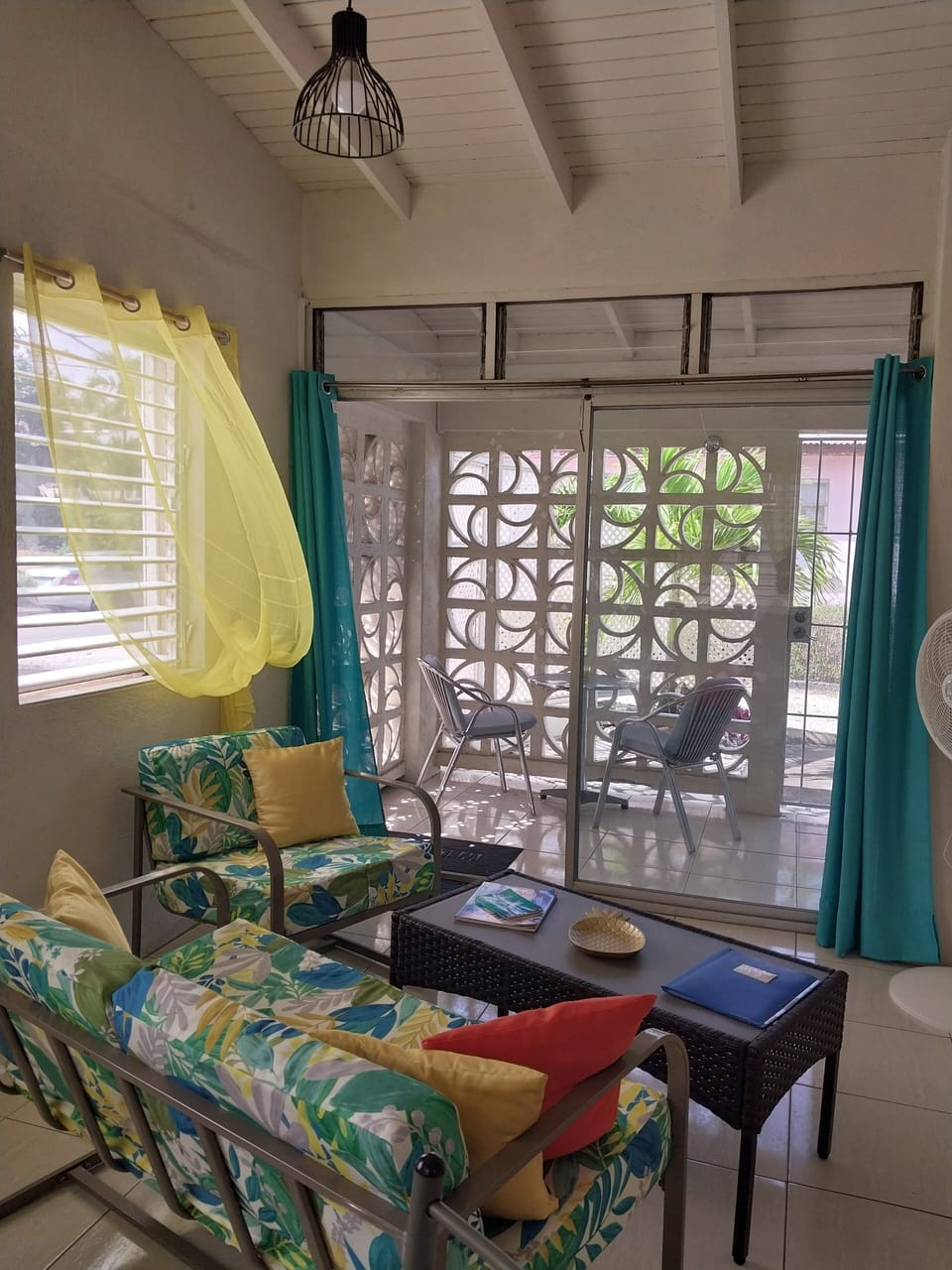 Living room and covered patio.