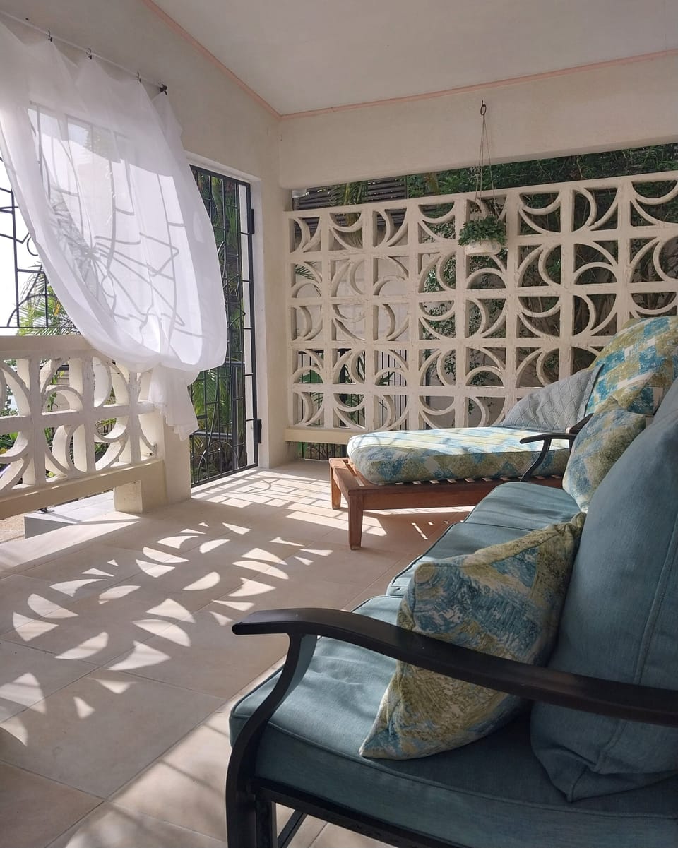 Enjoy the sea view from the spacious covered patio.