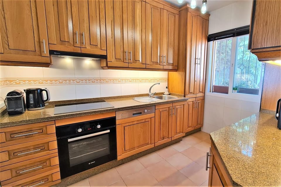 Kitchen in this property is fully fitted with all the appliances