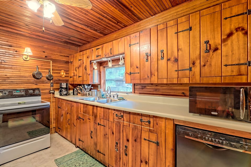 Kitchen, fully stocked with coffee maker, keurig, toaster, microwave, and more