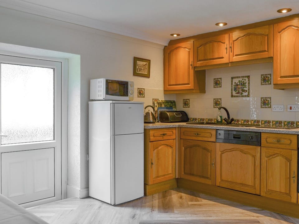 Well equipped kitchen area | Lorna&rsquo;s At The Grange - Grange Country House Holiday Cottages, Loweswater, near Cockermouth