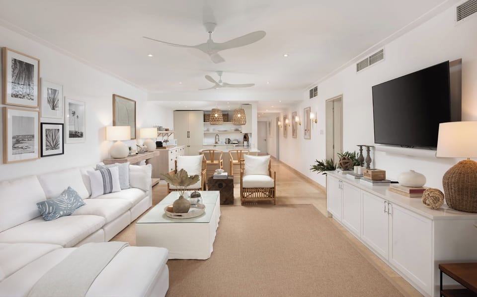 Decorated in neutral sandy hues, showcases eye-catching local artwork