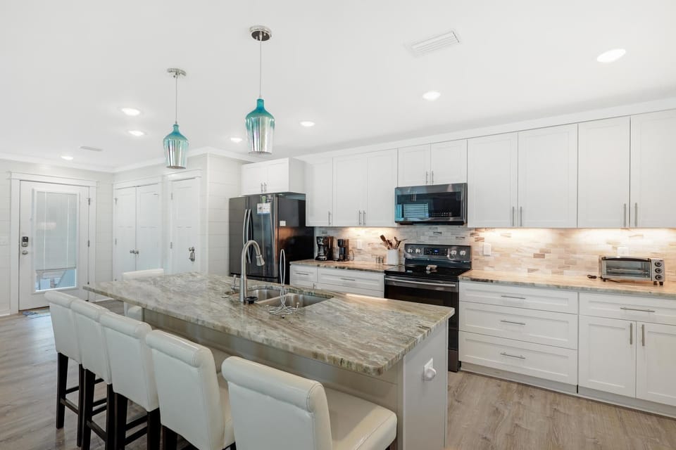 Fully Equipped kitchen with bar seating