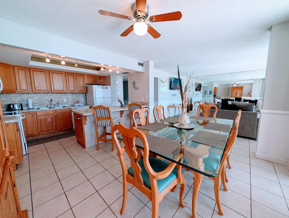 Spacious kitchen and dining area with bright, open layout