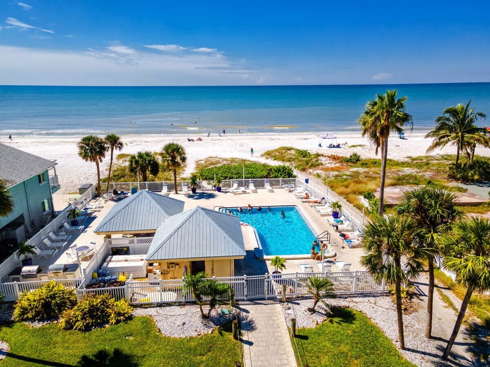 Pool area is just steps away from the beautiful white sand beach