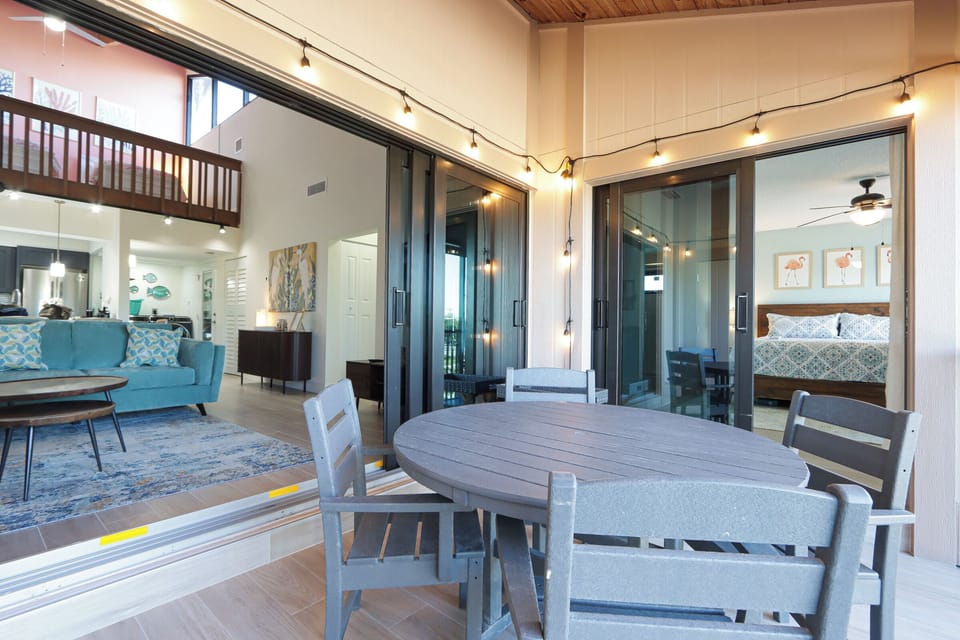 Lanai with outdoor dining table