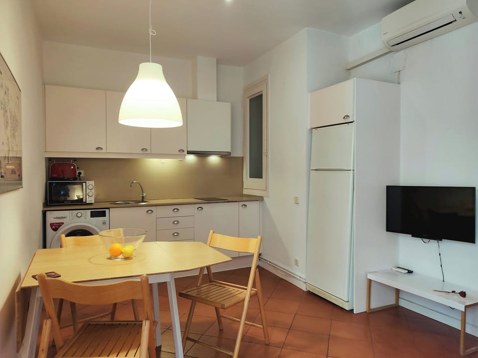 Open layout with integrated living and dining areas.