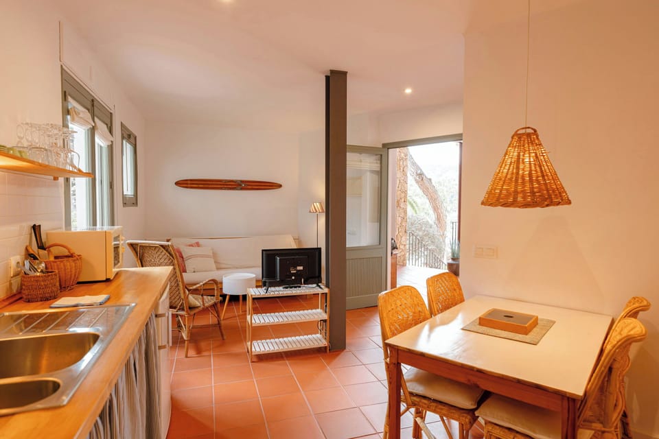 Open-layout kitchen and living area, perfect for cooking and relaxing together.
