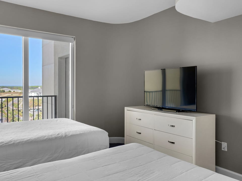 Guest Bedroom #2 with Double and Queen Beds and Flat Screen TV