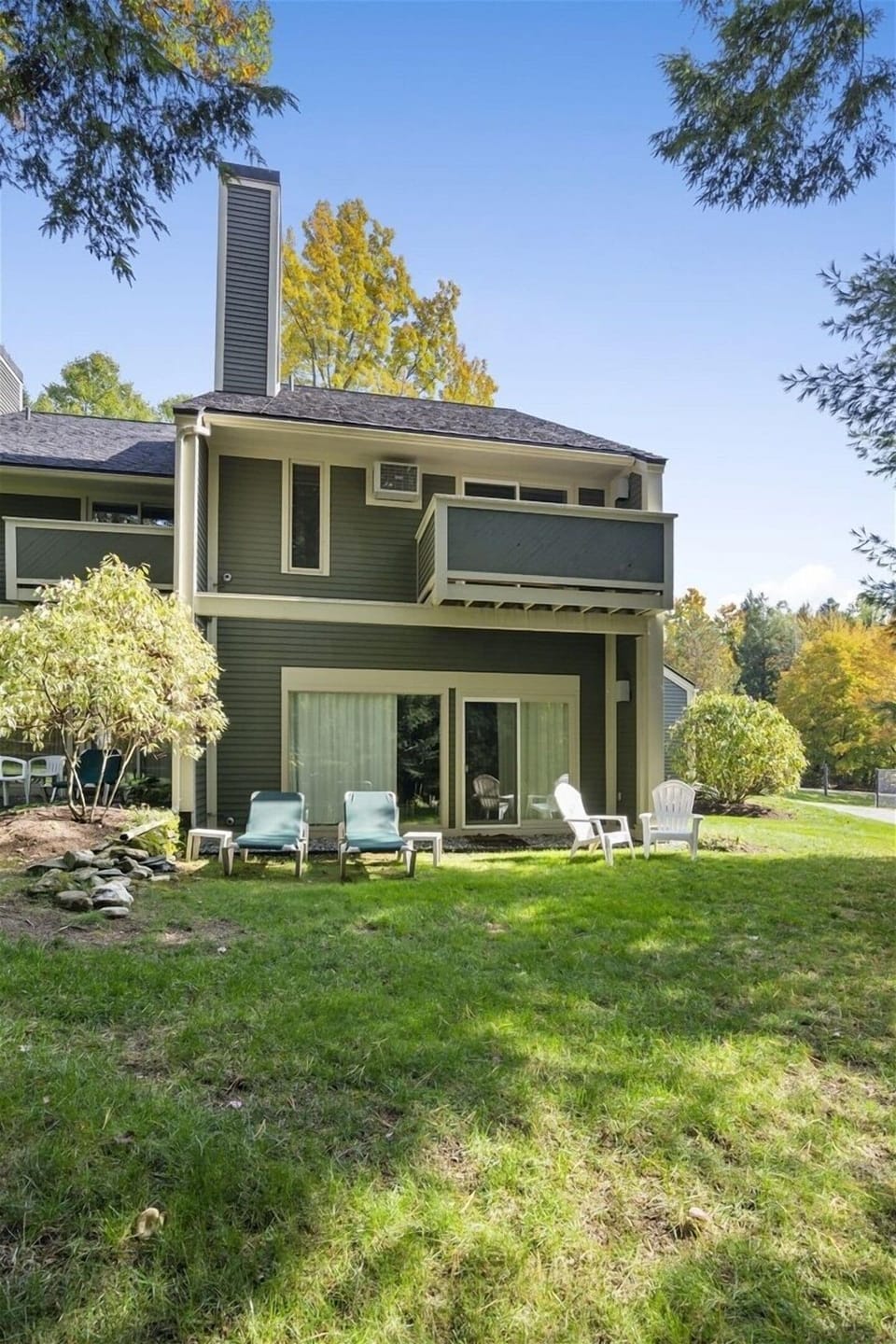 Expansive backyard perfect for relaxing or playing lawn games