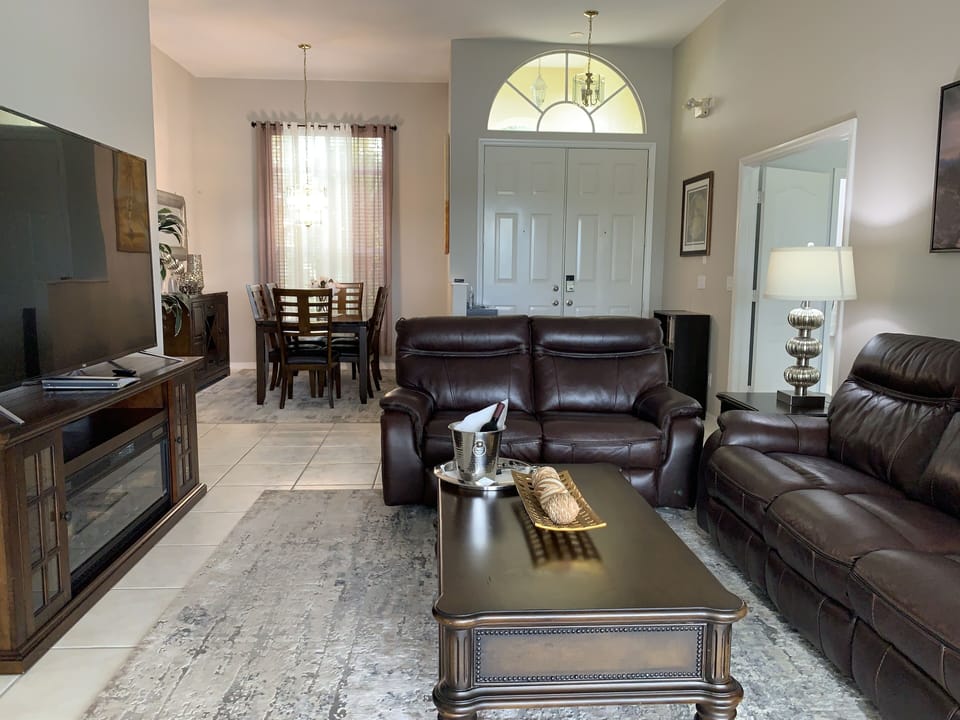 Family room with reclining chairs.
