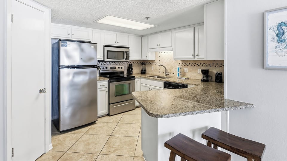 Fully Equipped Kitchen with Bar Seating