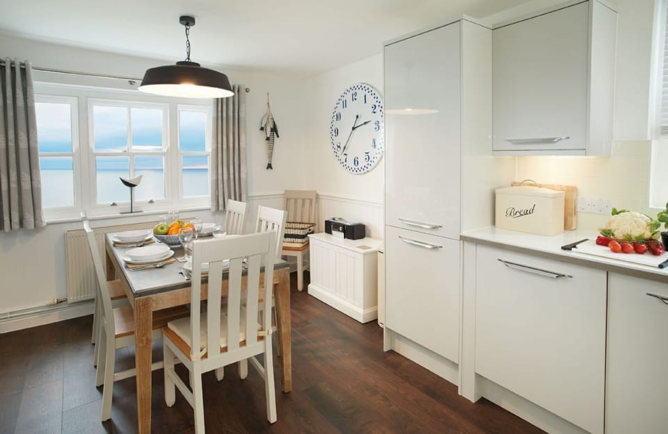 Ground floor: Kitchen with dining area which has sea views