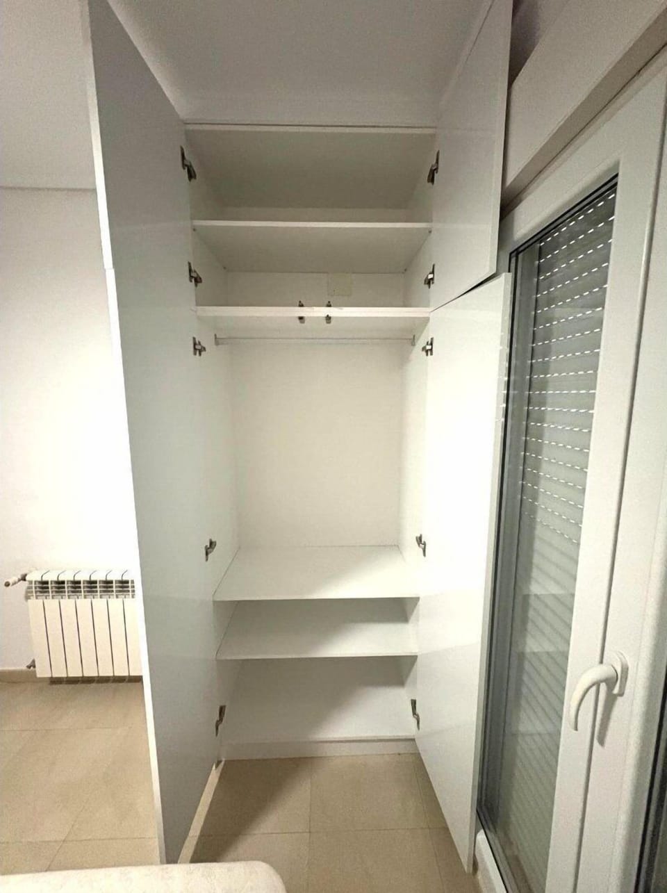 Wardrobe in Bedroom 1 with en suite