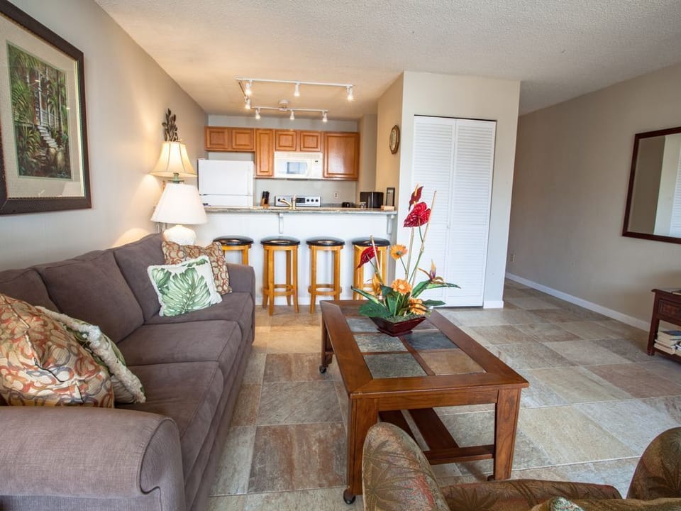 Kitchen has a wonderful update. Relax in comfort with air conditioning, cable TV, and high-speed WiFi. Sofa converts into a queen bed for additional guests.