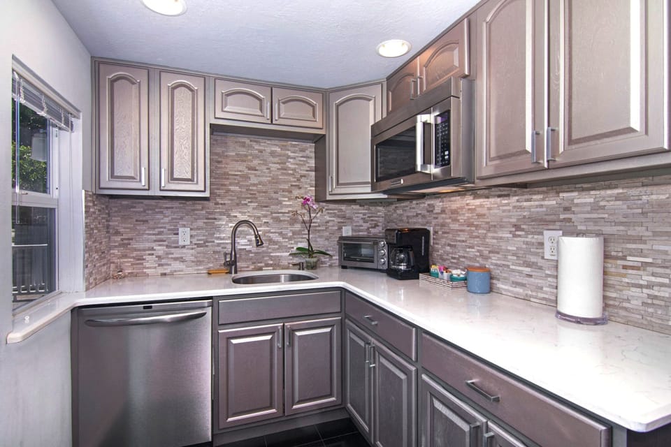 Fully equipped kitchen with stainless steel appliances