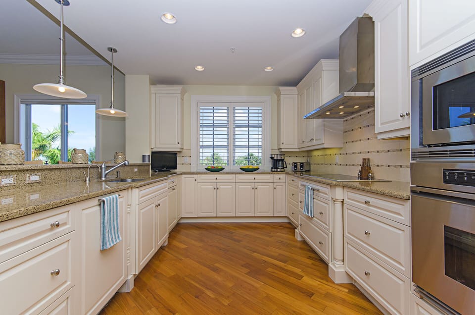 Kitchen with Sub Zero, second refrigerator and double ovens.  Full ocean view.