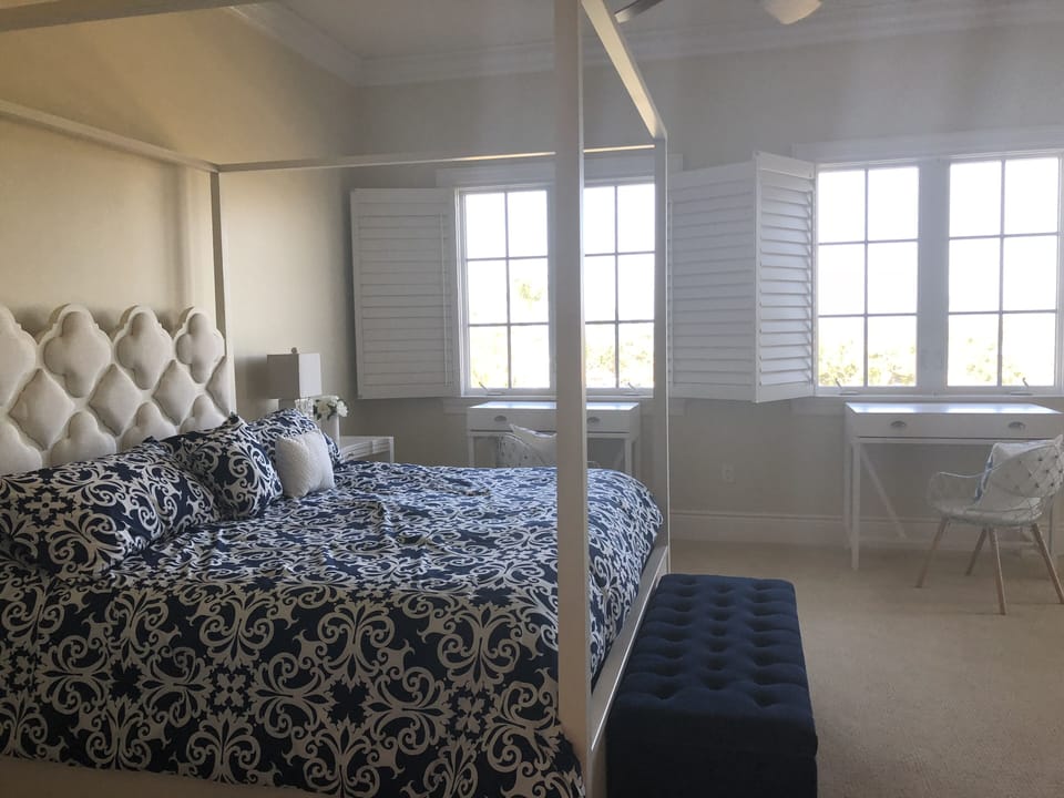Master bedroom with walk in his and hers closets plus full ocean view / balcony.