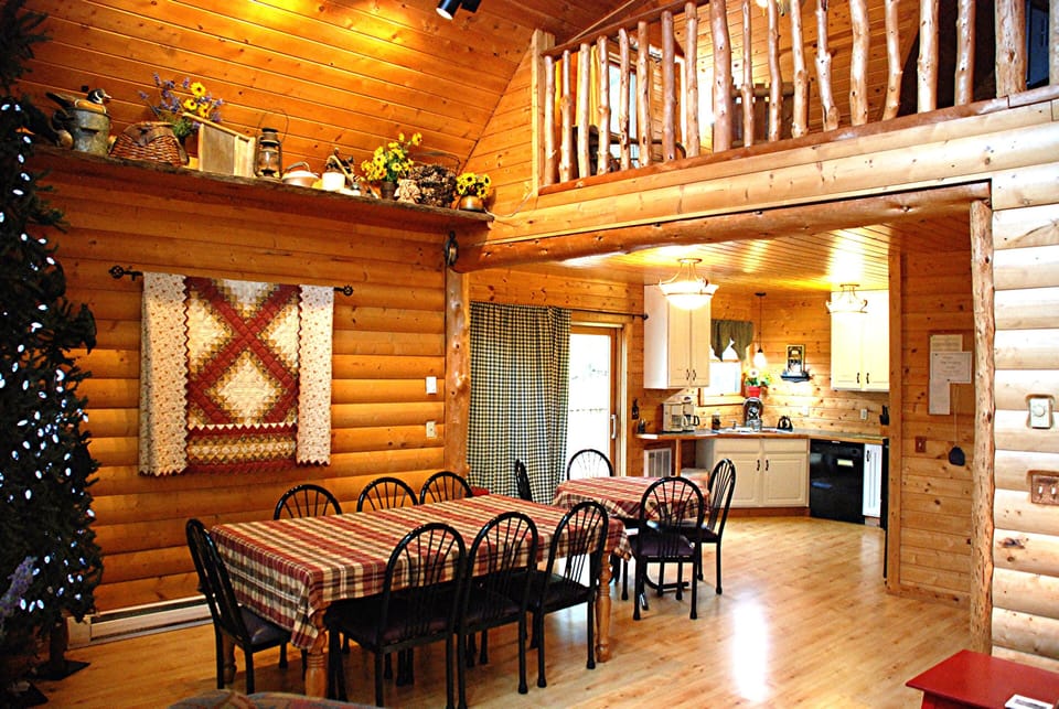 Dining area -loft over looking (12 chairs)  Picnic tables on deck