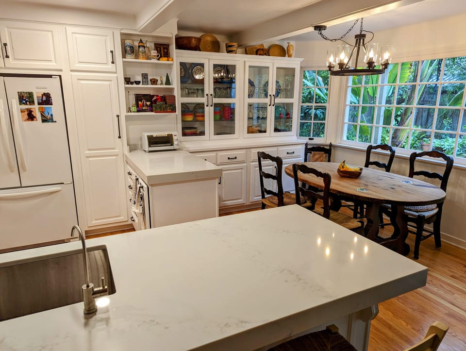 Breakfast table next to kitchen