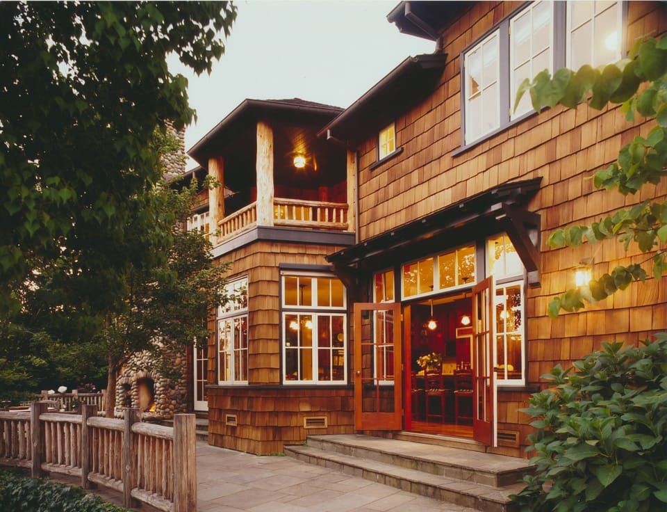 Exterior patio with river rock fire place
