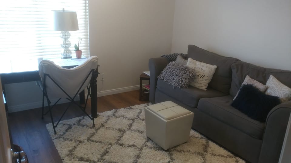 Upper level office with pull out queen bed and flat screen TV.