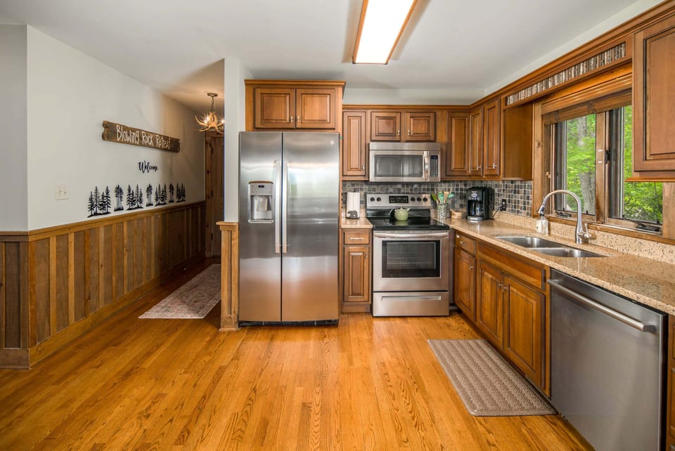 Prepare your favorite meals in the spacious kitchen with stainless steel appliances and generous counter space
