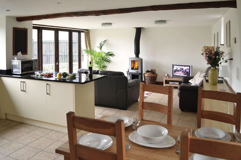 Ground floor: Large open plan well equipped kitchen/diner and living room
