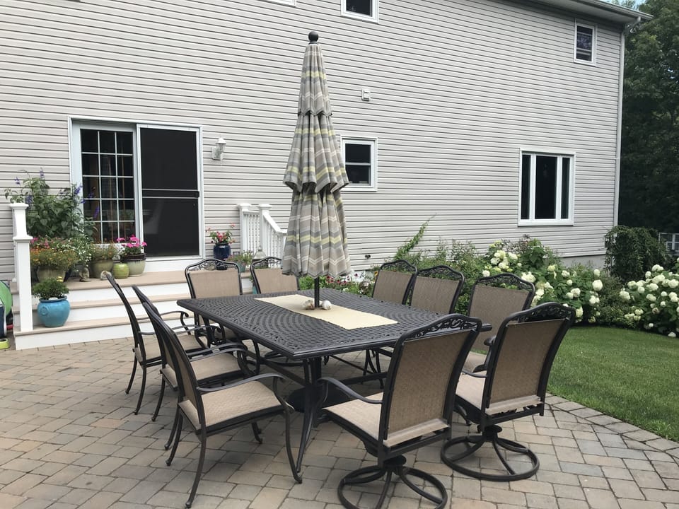 10 chairs - 4 arm chairs swivel/tilt 
huge tilting umbrella
